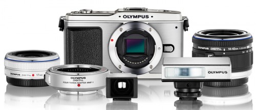 The first Olympus Micro Four Thirds system includes the E-P1 camera, two lenses, adapters for other types of lenses and a compact flash unit.