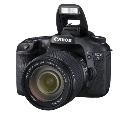 The 7D is shown here with built-in flash ready for action, with EF-S 15-85mm lens attached. I hadn't worked with this lens, but the camera itself should be a model for future EOS designs. Canon photo.