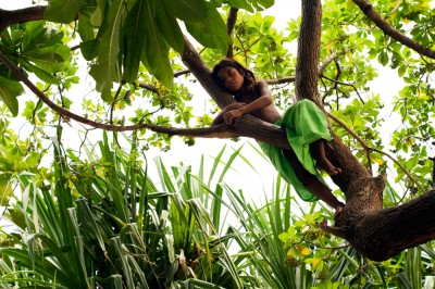 A little girl playing in a tree on the island of Tarawa. ©Malin Fezehai