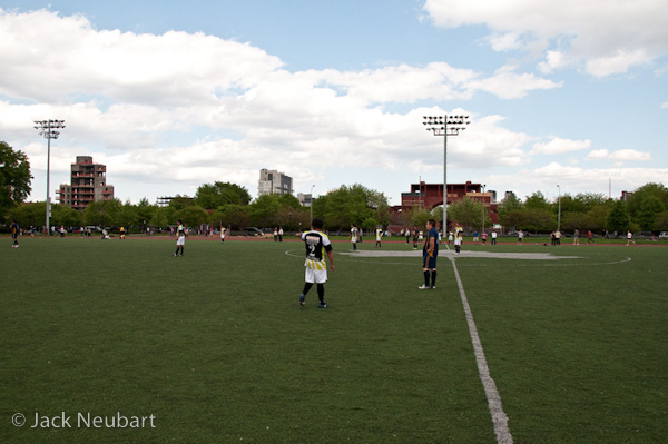 ZOOM RANGE. The zoom range on this lens is certainly impressive. Numbers don't tell the whole story. You really have to see it. I aimed the camera across a recently renovated soccer field toward a dilapidated city swimming pool, setting focal length at the short and long end. (Zoom range for this shot: 18mm) Photo Copyright  ©2009 Jack Neubart. All rights reserved.