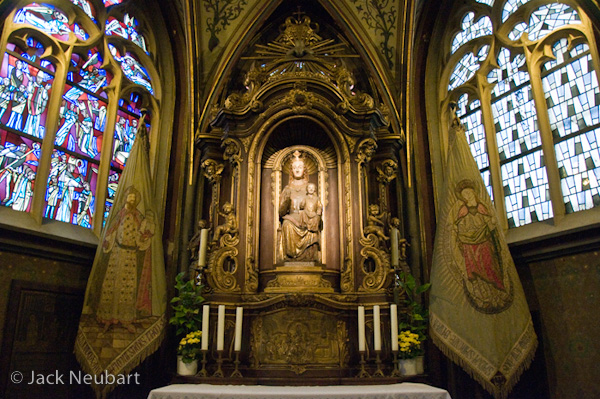 INTERIORS. I shot this interior of Aachen Cathedral (Aachen, Germany) with the lens at 18mm, wide open at 1/50 second (ISO 3200), and the camera of course handheld. By the way, they charge a nominal fee and issue a tag permitting you to take pictures inside this amazing medieval structure that dates back to the reign of Charlemagne. Look carefully and you'll detect a modicum of barrel distortion at the bottom edge of the frame. Photo Copyright  ©2009 Jack Neubart. All rights reserved.