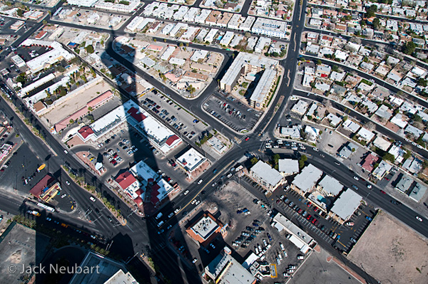 LANDSCAPE. For this street scene with the menacing tower shadow (shot from the Stratosphere tower, Las Vegas), I positioned the lens as squarely as possible against the glass, which was angled downward. Photos Copyright  ©2009 Jack Neubart. All rights reserved.