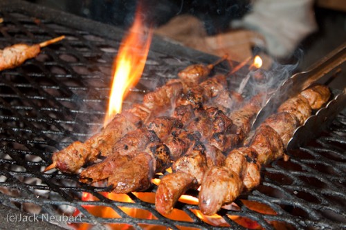 All fired up. I wanted to capture the flames shooting up from the grill, so I set a relatively long exposure (1/15 sec) and fired a 430EX flash to provide overall illumination. Copyright  ©2009 Jack Neubart. All rights reserved.