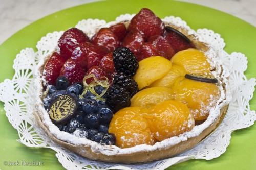 GOOD ENOUGH TO EAT. I photographed this tart through the display window of a gourmet bakeshop by available light, holding the camera firmly against the glass for this f/5.6 exposure.  ©2009 Jack Neubart. All rights reserved.