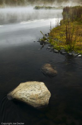 Stepping Stones, Hot Springs (near HÃºsavÃ­k, Iceland).    The small protrusion at the lower-left of the lower-left rock creates a slight interruption to the circle here.