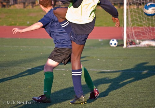 Soccer. I was pleasantly surprised by the K-x's ability to capture breaking action with continuous AF. Since these were minors playing, I avoided shots showing faces. I used the 50-200mm lens with a 1/500 sec shutter speed (ISO 800).  ©Jack Neubart. All rights