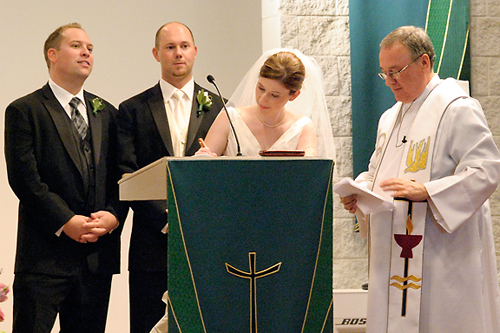 During this ceremony, I needed to use ISO 1600 and a 1/40 sec. shutter speed because of the low light conditions. The image is grainy due to digital noise at the high ISO but the exposure is fine. There's no blurring because I used a lens with an image stabilizer and braced my elbows on a solid object. (86mm focal length.)  ©2010 Peter K. Burian